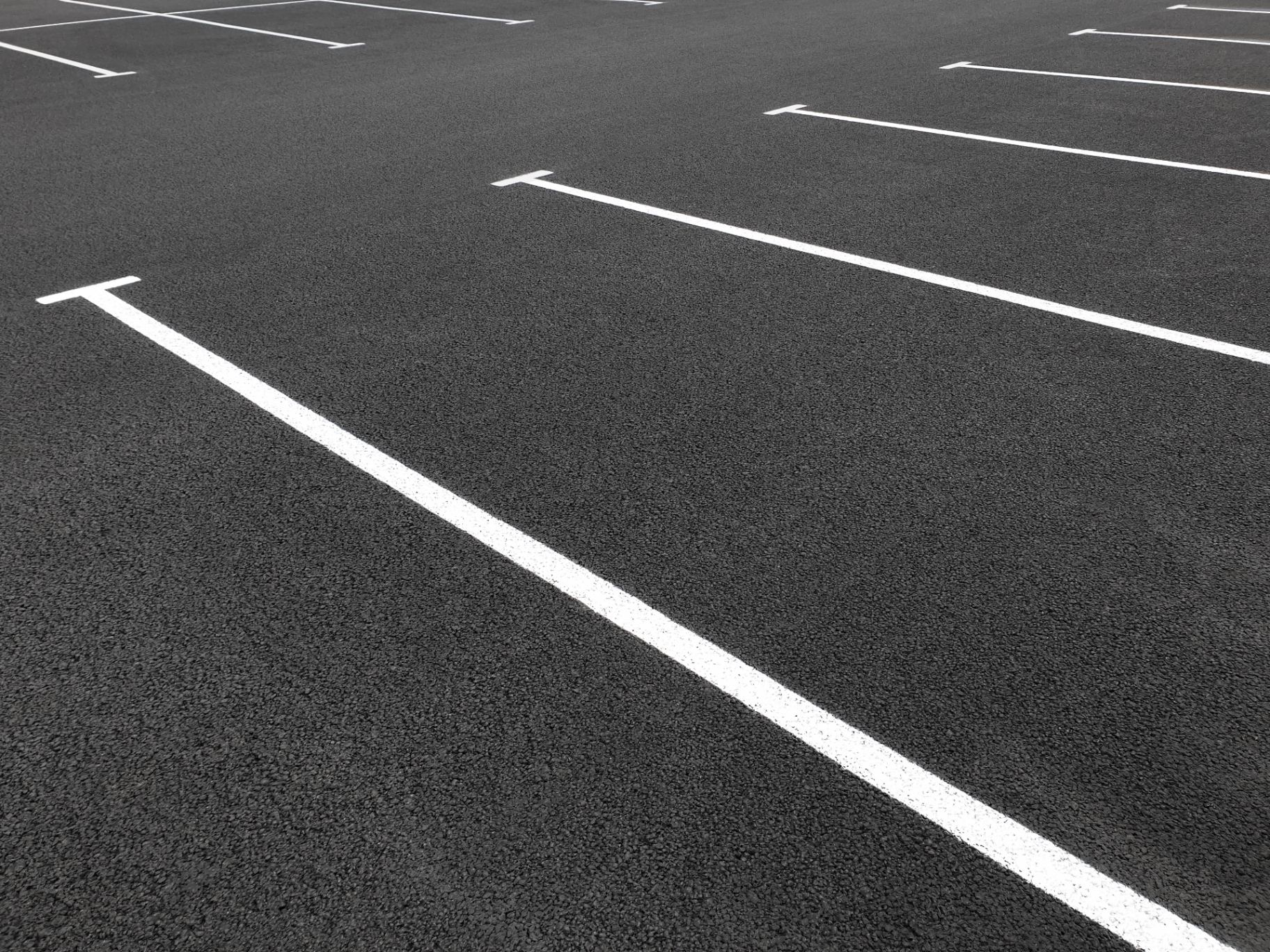 Sealcoating & Crack Sealing service - professional sealcoating & crack sealing for commercial parking lots and pavement